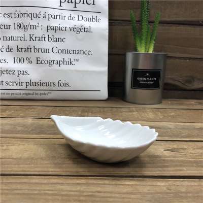 White porcelain  ceramic plates with leaf design for salad dessert  and fruit use for restaurant and hotel use